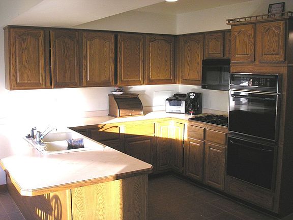 Large open kitchen with bay window breakfast area