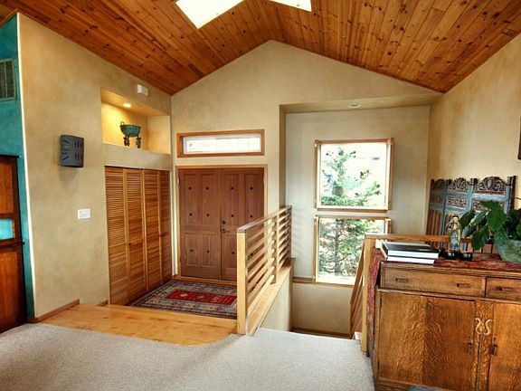 Grand Entry open to the living room, dining and kitchen.