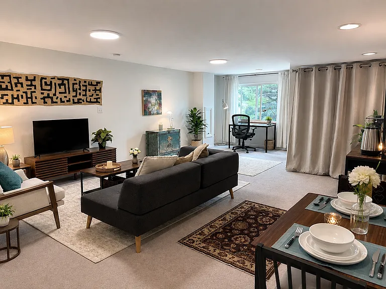Private and spacious living area showing office area and kitchenette