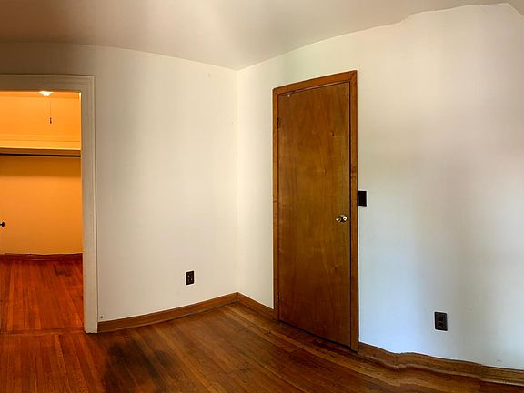 Bedroom with walk-in closet