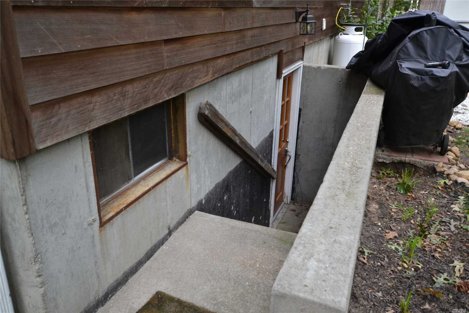  Rear Basement Egress  w/ Full Drainage