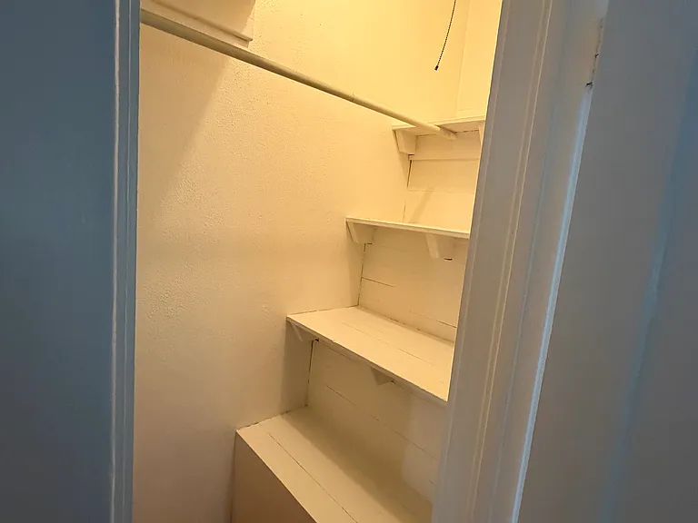 Hallway closet outside master bedroom