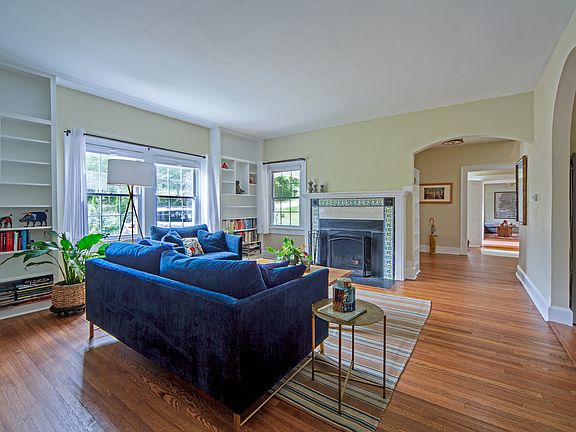 Living room with wood burning fireplace