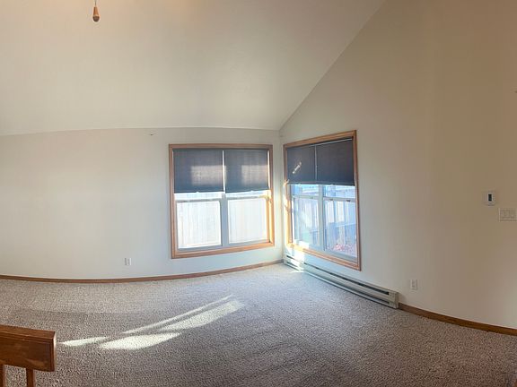 Living room, front entrance and garage entrance