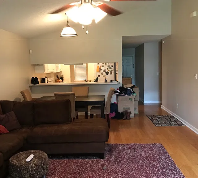 Old photo of living/dining/kitchen to visualize with furniture