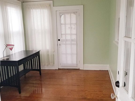 Front entry Sunroom and Den