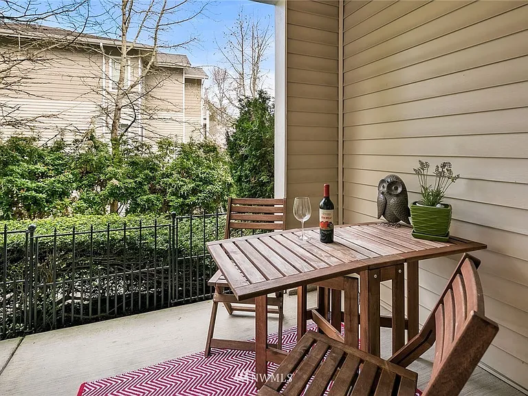 Private patio overlooking green grass