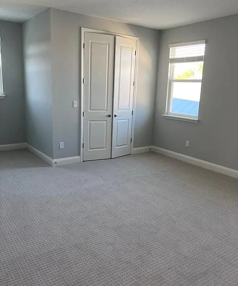 Larger of the two bedrooms upstairs