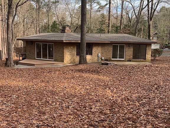 Back of house with deck.