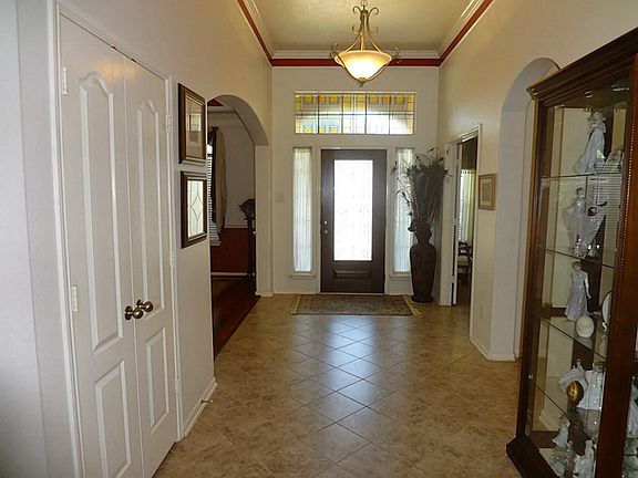 Enter home through leaded glass front door and tile entry way. Nice!