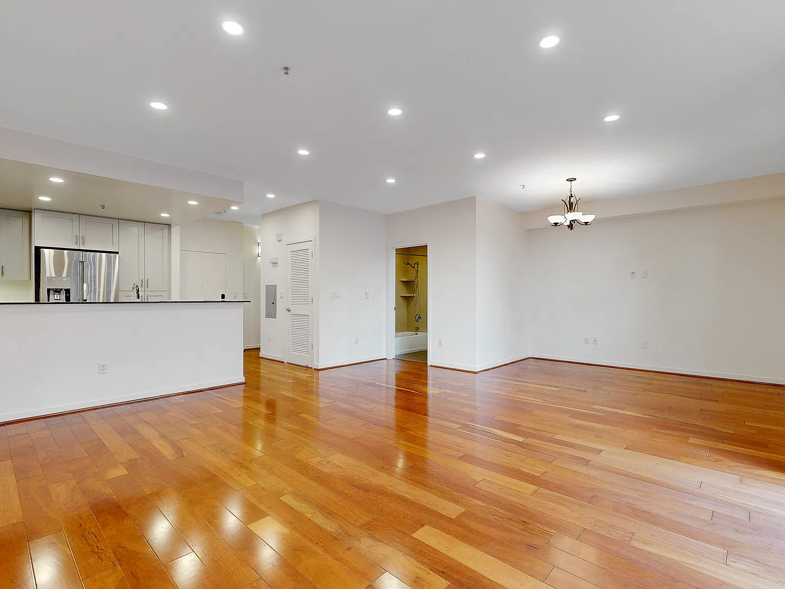 Spacious Two-Level Condo with EV Parking Included — Photo 2