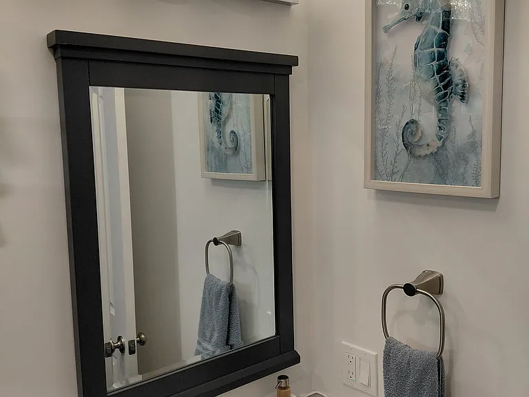 Bathroom with bright LED Lighting, Granite Vanity, Brush Nickel Faucet and Towel Holder