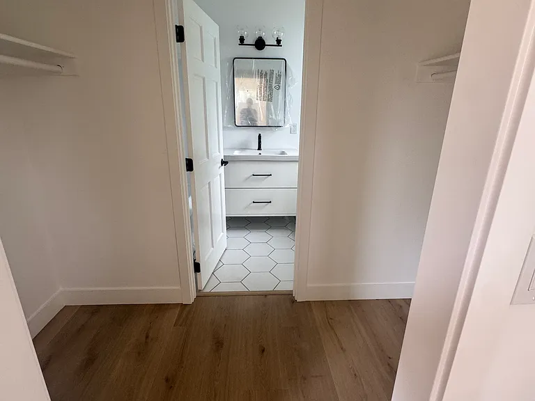 primary bedroom ensuite and large closet on each side