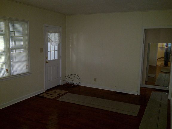 Living Room - gleaming hardwood floors and fresh paint!