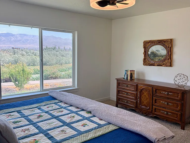 Master bedroom with river and mountain views.