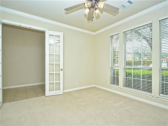 To the left of the entry is a great office area that looks out to the front and includes office doors.