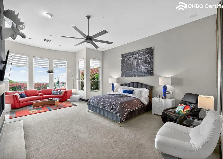 Huge primary wing w/ massage chair and California King bed