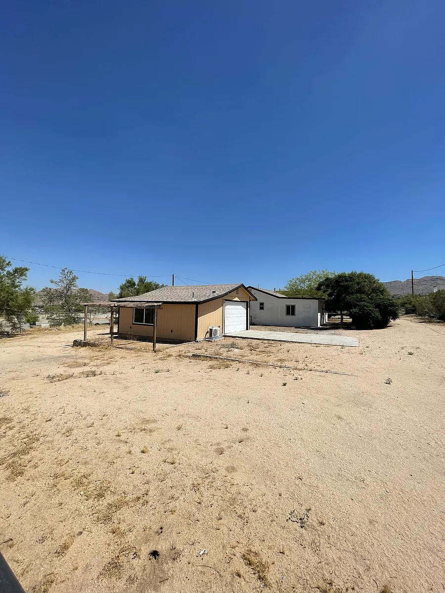 Building Photo - 61056-29 Palms Hwy
