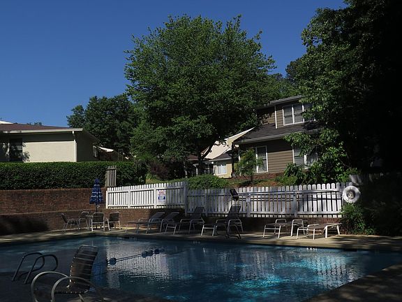 home overlooks this swimming pool that is rarely used!