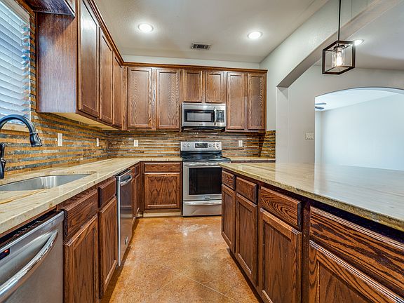 2714 Merida. Duplex home near TCU. Kitchen with all stainless steel appliances included.