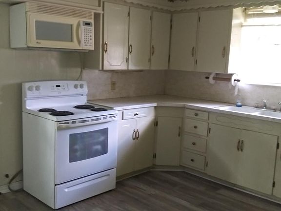 New Vinyl plank flooring in Kitchen & Bonus room.