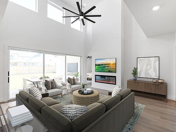 Great room with fireplace and sliding glass doors