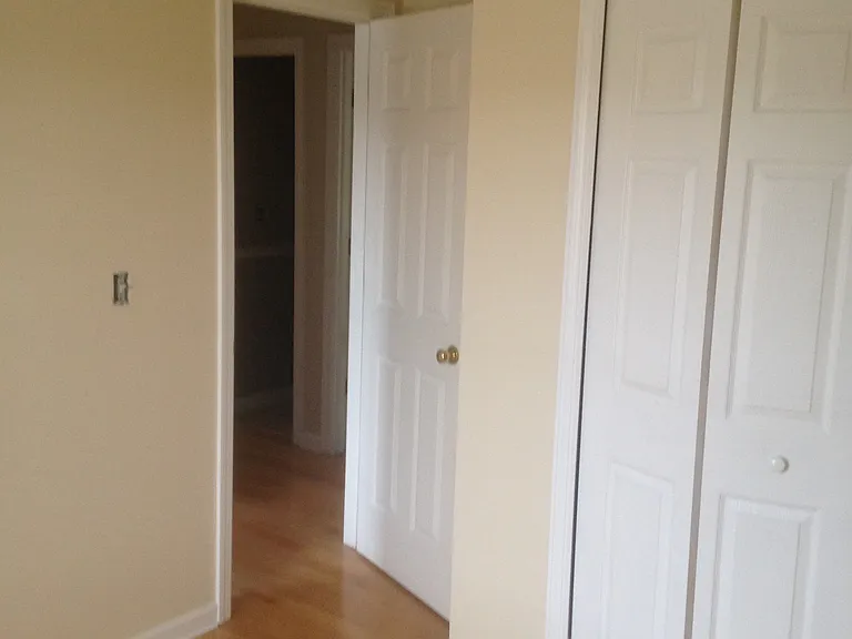 bedroom with h/w floor