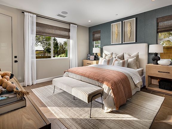 The Primary Bedroom enjoys a private space at the back of the home, offering residents an en-suite b