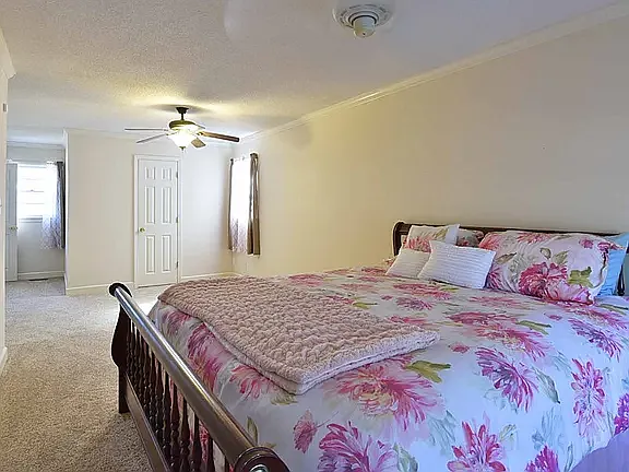 master bedroom with walk in closet view