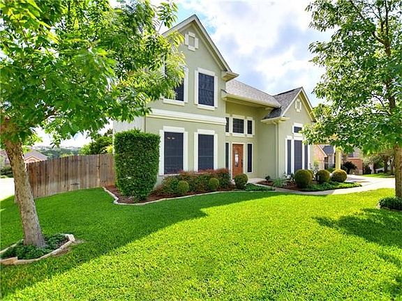 Beautifully maintained home and yard with solar screens to enhance the energy efficiency!