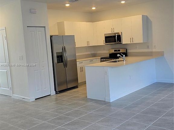 5th image of 713 NW 13th St