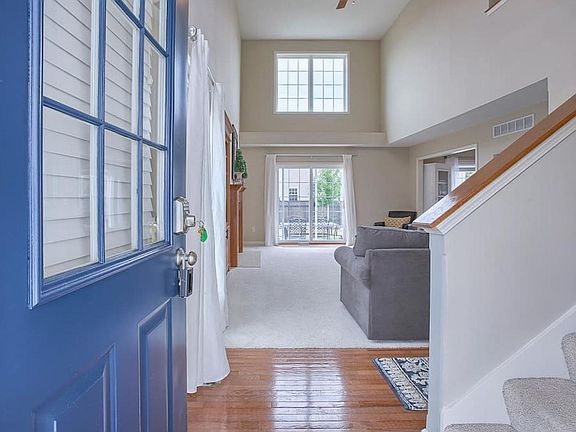 Vaulted ceiling & abundant windows add sunny natural light