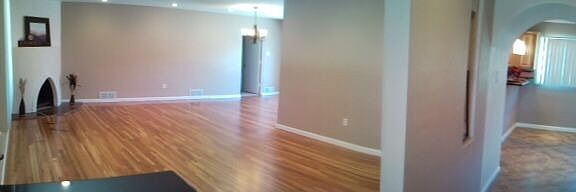 Refinished hardwood floors, kiva fireplace, custom lighting, view - front door