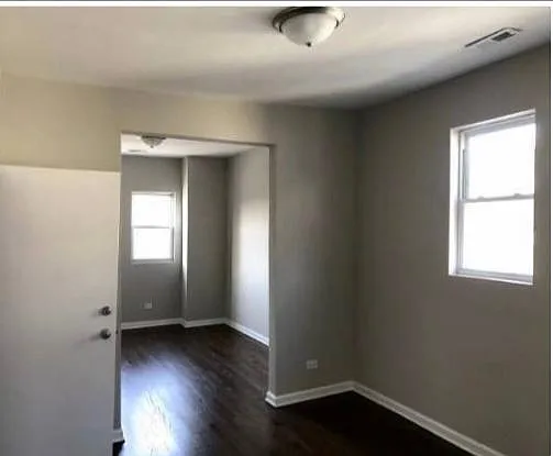 Building Photo - 6035 S Loomis Blvd #2