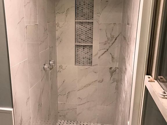 Frameless glass door installed before move-in