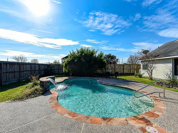 Great space for relaxation and fun. Privacy fence and landscaping.