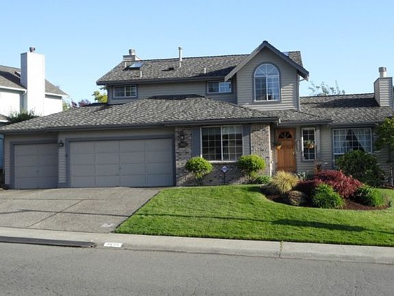Look at what springtime looks like in your front yard!  Don't miss the driveway bridge - no bumping over the curb!  3 car garage must hold any RVs and boats, but it is extra large.