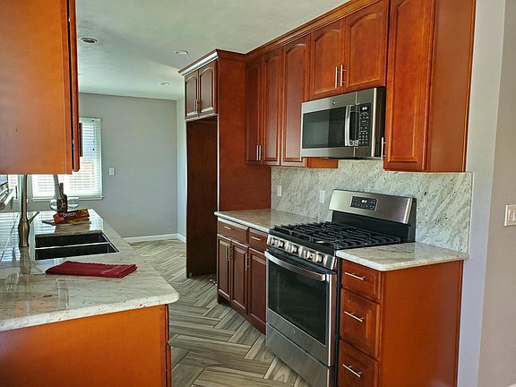 Brand new stainless steel appliances -refrigerator /freezer with water and ice maker on its way.