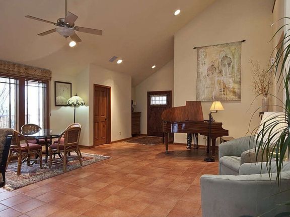 "Spacious entry & sitting area with room for your grand piano"