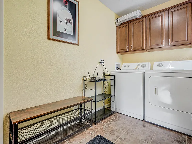 Full size washer and dryer in the homes laundry room!