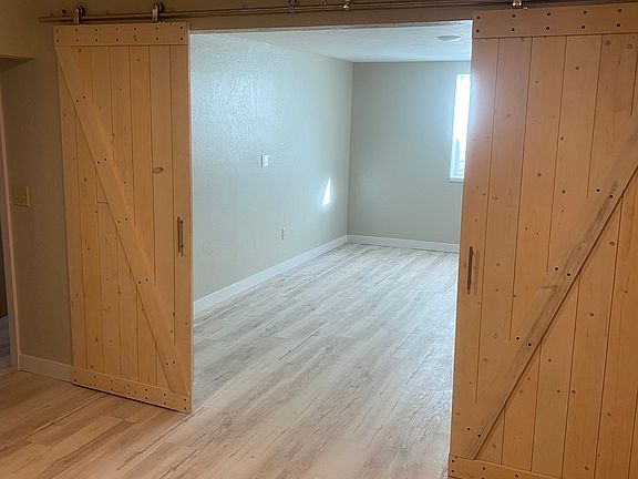Sliding barn style doors to bedroom.