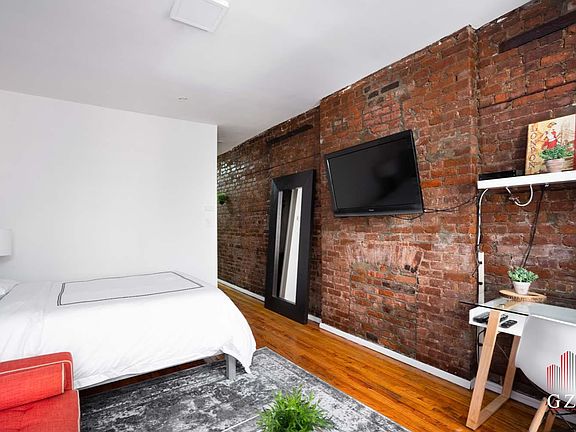 2nd image of 319 E 14th St APT 2C