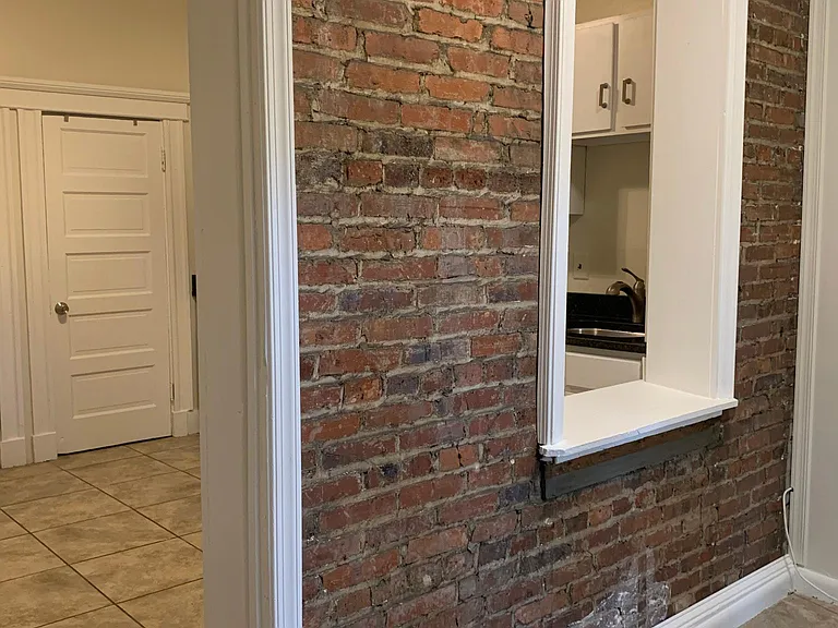 Exposed Brick Off Kitchen