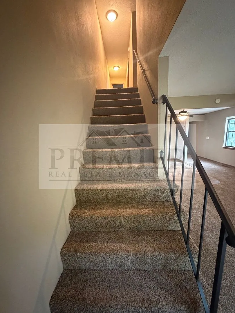 3 bd/1.5 ba townhome - 3556 NE Independence Ave, Lee's Summit, MO 64064 // Rent $1375 (end unit) — Photo 1