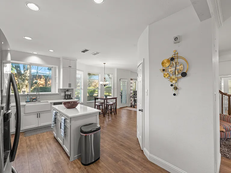 Clean, welcoming kitchen with modern appliances and plenty of counter space.