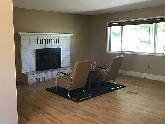 Living room w/wood fireplace