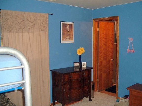 Downstairs Bedroom with half bath access