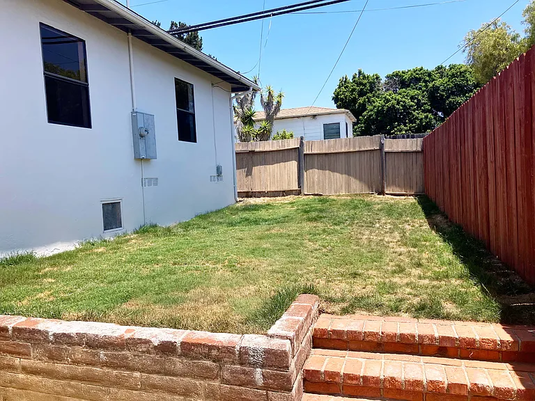 Backyard, photo from the patio facing the alley