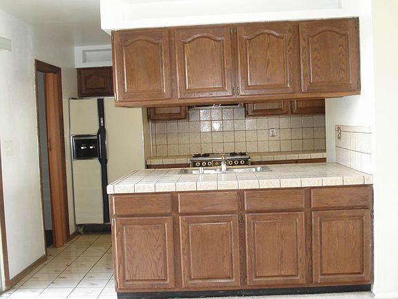 Open Kitchen with tile counters