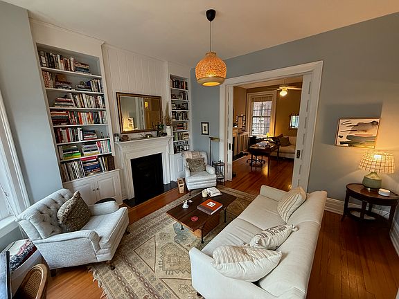 Functional pocket doors between front room and Bedroom 1 (shown set up as an office)